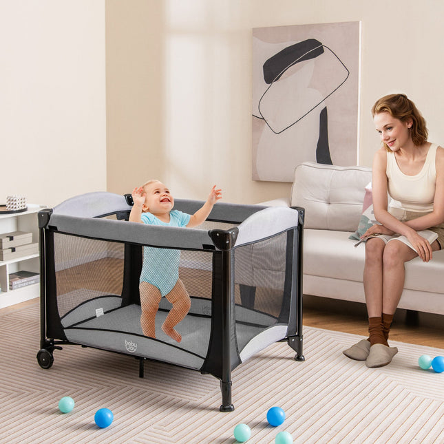 5-in-1 Portable Baby Playard with Cradle and Storage Basket